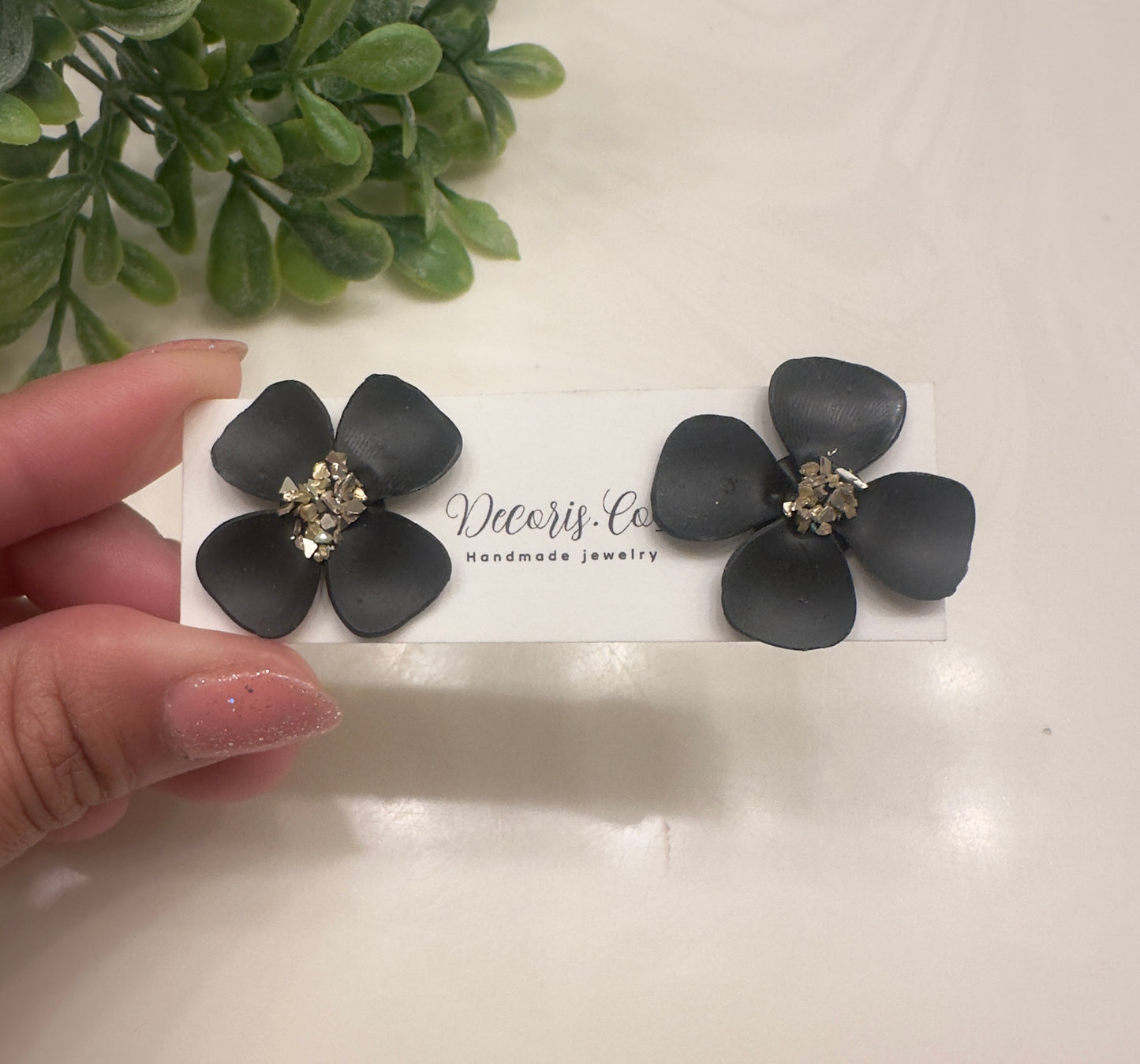 Black floral stud